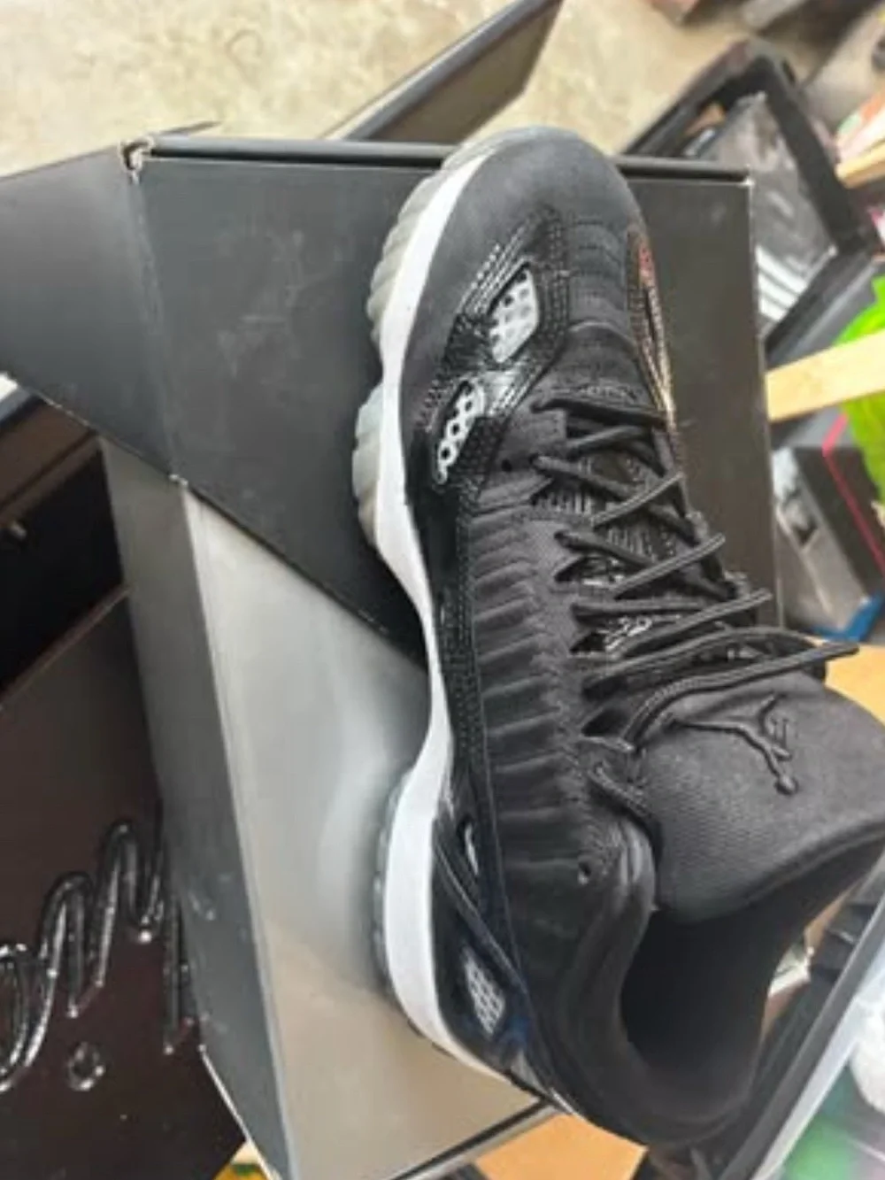 Jordan Retro Low IE Sneakers in Black and White